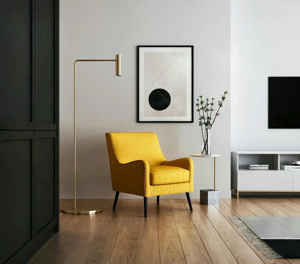 Sunny yellow armchair in a bright, freshly cleaned living room